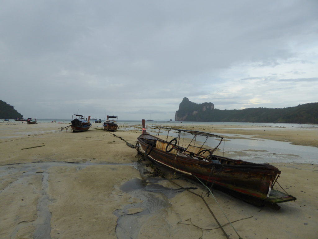 beached longtail boat