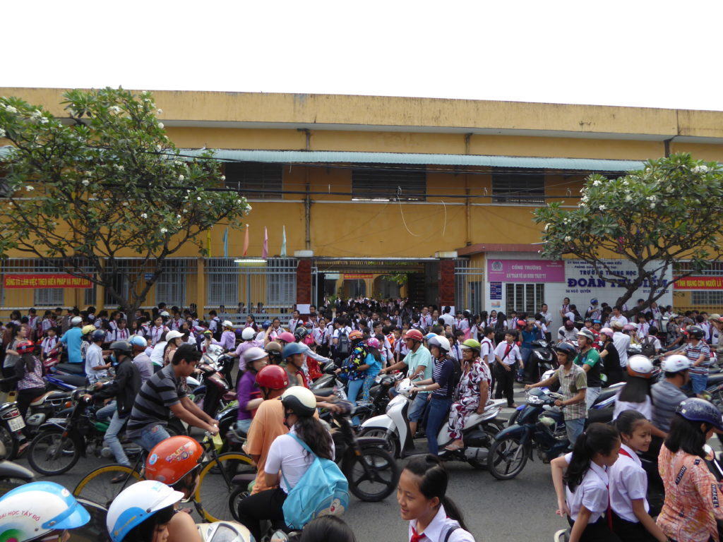 Mopeds pick up schoolchildren